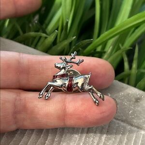 Avon Reindeer pin Christmas silvertone reindeer with red enamel brooch